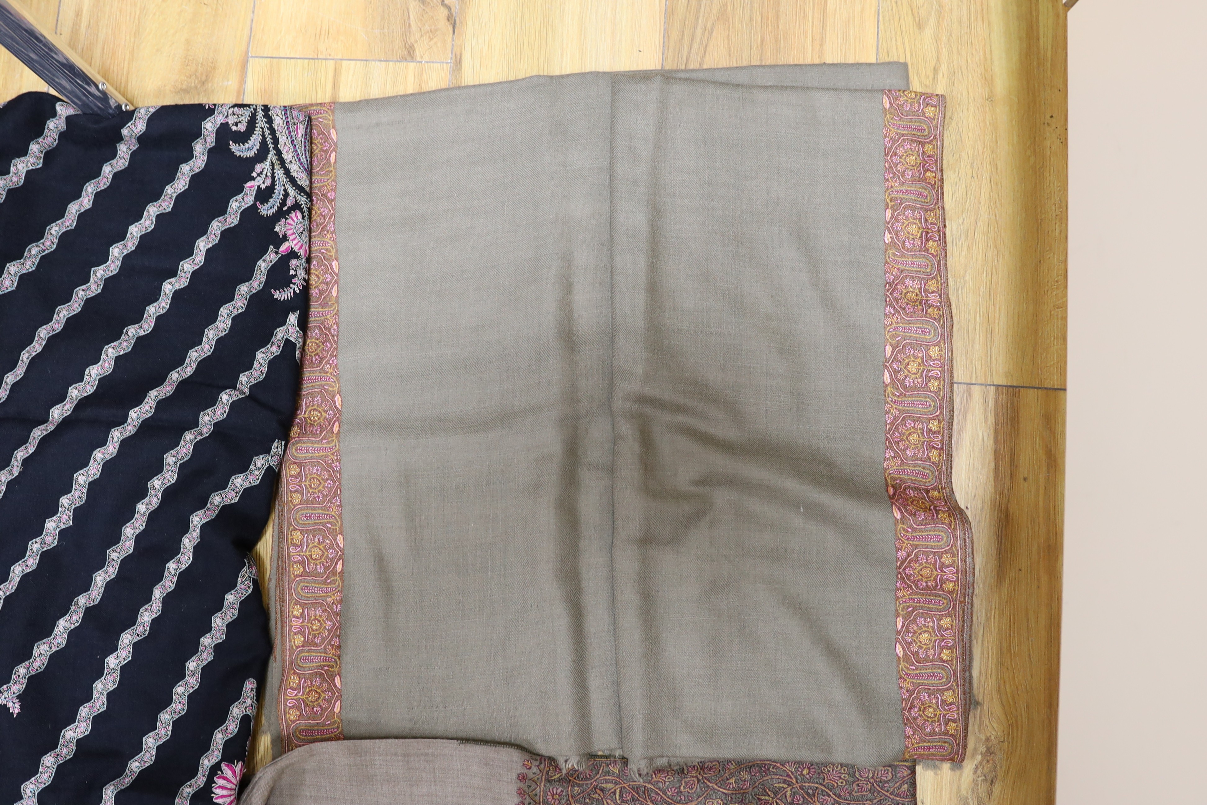 Four Indian wool and cashmere shawls, three silk embroidered